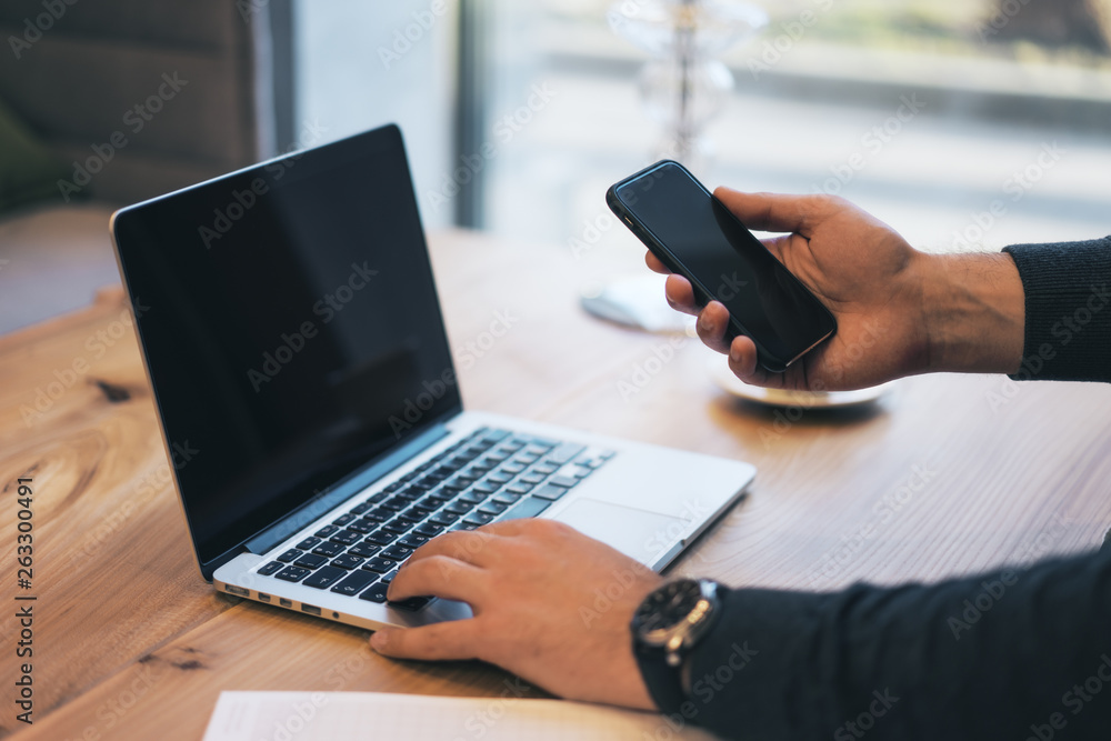 Poster Man using empty laptop screen on desk