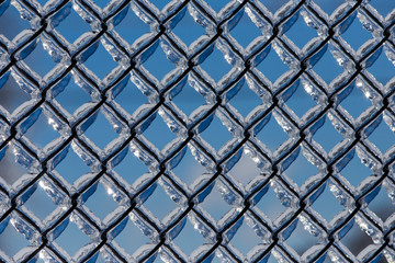 Fototapeta premium Abstract background with ice on metal fence
