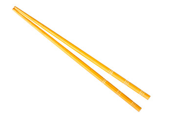 Yellow chopsticks isolated on white background