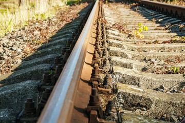Short railroad segment close up.