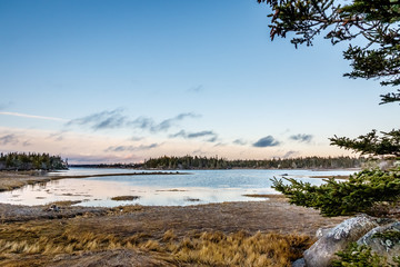 Seascape lighthouse coastal shoreline images of Cape Island, Nova Scotia Canada.