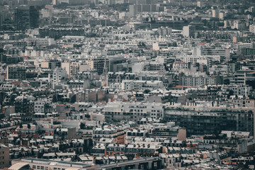 Polluted and crowded innercity of Paris, France from the birdview of the Eiffel tower reminding how crowded and polluted multicultural big cities can get.