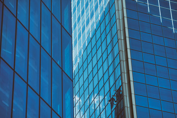 Fototapeta na wymiar Glass Windows Of Skyscrapers