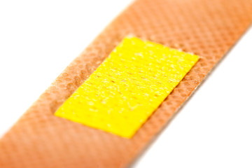 Medical adhesive bandage isolated on white background