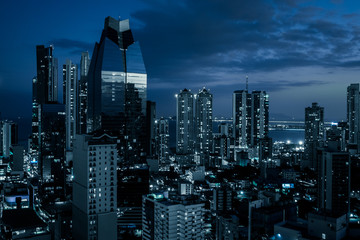 city skyline at night - modern office buildings in business district