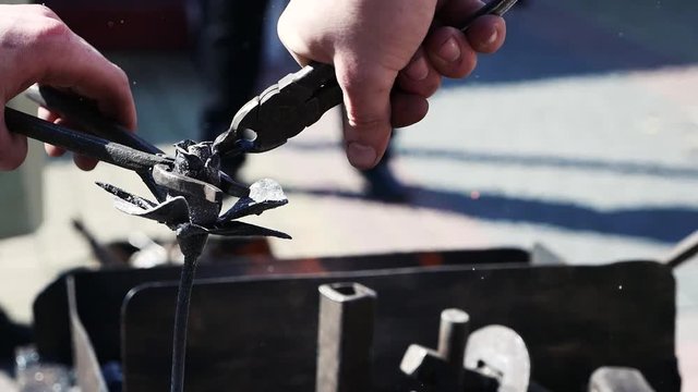 The smith creates sculptures