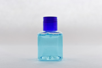 blank isolated bottle, blue liquid