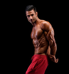 Fototapeta premium Handsome Muscular Men Flexing Muscles