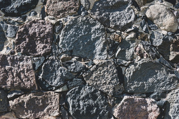 old textured and aged stone wall background