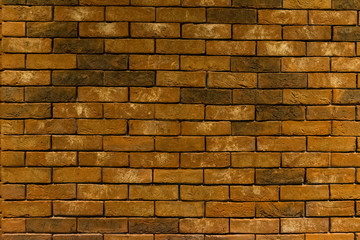 old yellow and brown brick wall, texture pattern, background