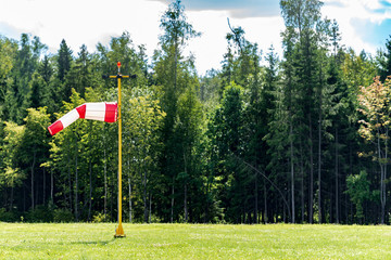 Windsock at the start. Where air travel begins. Giving the right to flight.