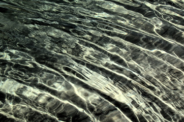 Fototapeta na wymiar Caumasee; ripples on the waters of the Grisons' famous lake, Swiss Alps