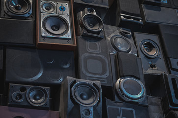 Wall of vintage loudspeakers. Creative music background. 