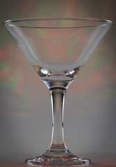 Martini Glass with smooth flashing green and yellow lights on background