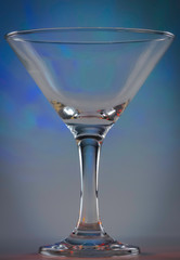 Martini Glass with dark blue lights on background