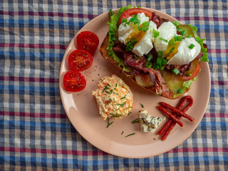 Toast with bacon, tomato ,pickle and boiled eggs