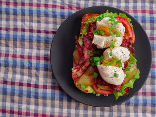 Toast with bacon, tomato ,pickle and boiled eggs