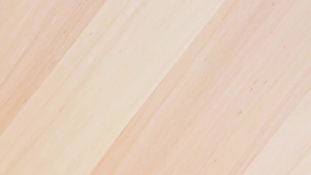 Light brown wooden surface texture rotation background