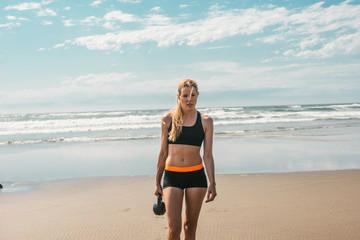 Woman working out on beach