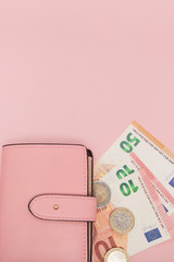 Wallet with Euro Currency on a Vibrant Blue Background. Business Concept and Instagram