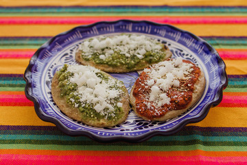 mexican tlacoyos with green and red sauce, Traditional food in Mexico
