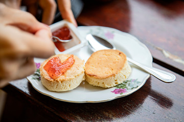 Strawberry jam scones on a plate
