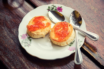 Strawberry jam scones on a plate