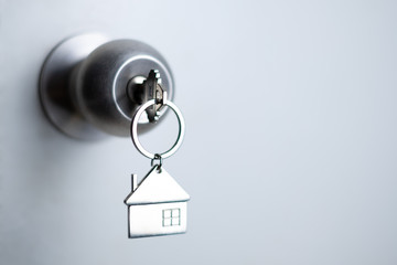 closeup key on the door, personal loan concept. soft focus.