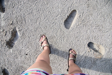 Walking on the sand by the sea