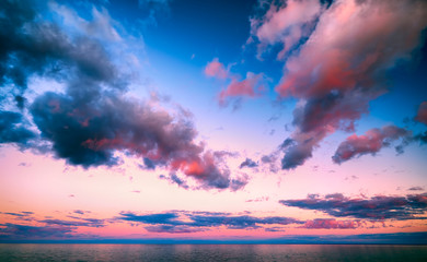 Fototapeta na wymiar Beautiful pink sunset clouds over Lake Superior