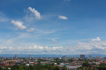 white cloud on blue sky above the town, aerial view cityscape