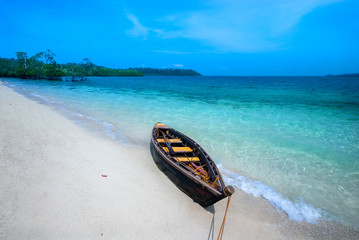 Traditional wooden boat on a beach of Havelock Island, Andaman and Nicobar Islands Union Territory...