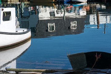Fototapeta na wymiar Fishing boats and reflections