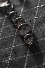 Rain Water droplets on a black waterproof fabric