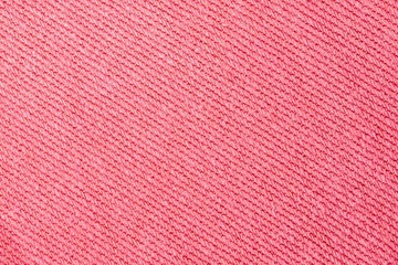 Pink jeans fabric texture, close up surface background