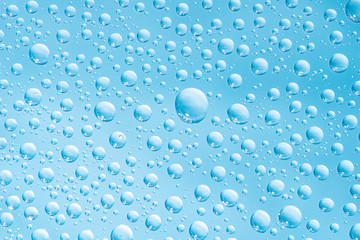 Close up picture of water drops on glass background