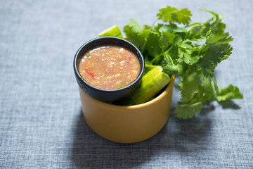 Spicy shrimp paste chilli sauce served with fresh cucumber and coriander