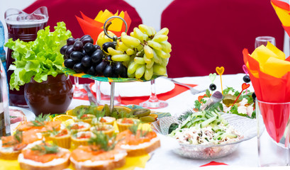 Laid table with fruit and drinks. Holiday. Horizontal orientation