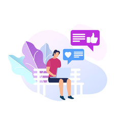 Man Sitting on Bench in Park with Laptop in Hands