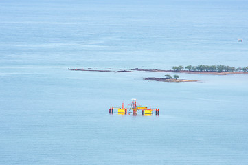 Oil rig and island in the sea coastline at Laem thian beach , Chumphon in Thailand.