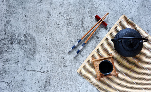 japanese tea set oriental drink style and chopsticks on the table