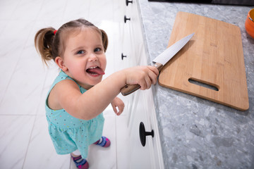 Girl Taking Kitchen Knife