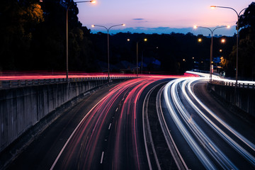 Traffic light trails at dusk down Ryde Road, seen from the Pacific Highway Bridge at Pymble.