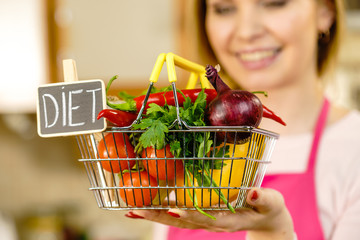 Shopping backet with dieting vegetables