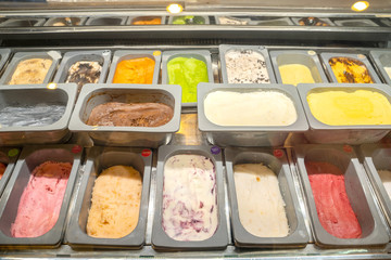 Many of flavor ice cream in tray at confectionary shop