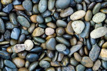 small rock on the beach.