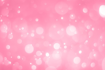 abstract soft pink background with light glow bokeh effect
