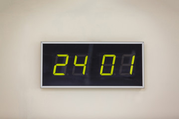 Black digital clock on a white background showing time 24.01 minutes