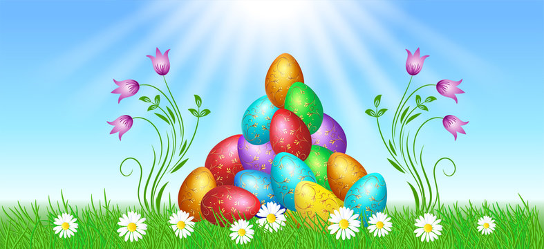 Bunch of Easter eggs with golden ornament on grass and rays in blue sky