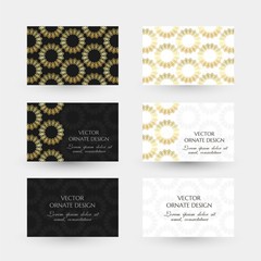 Golden rings in geometrical style. Business cards with ornaments on the black and white background.